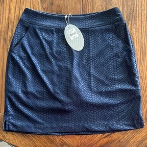 NWT Greg Norman navy blue snake print golf skort. Approx 17” long.